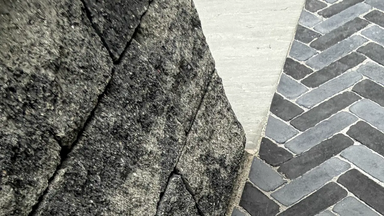 Herringbone paver walk and retaining wall detail