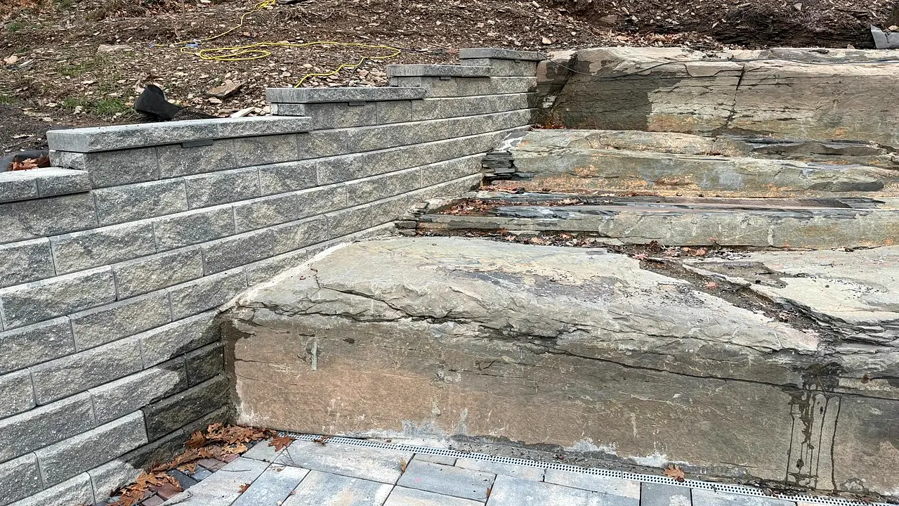 Hudson Valley ledge, retaining wall, and hardscape site condition