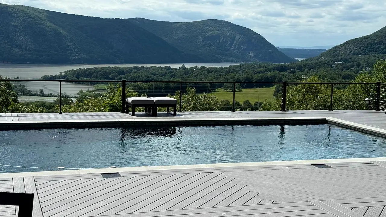 Trex Transcend Lineage deck surface beside a pool and river view