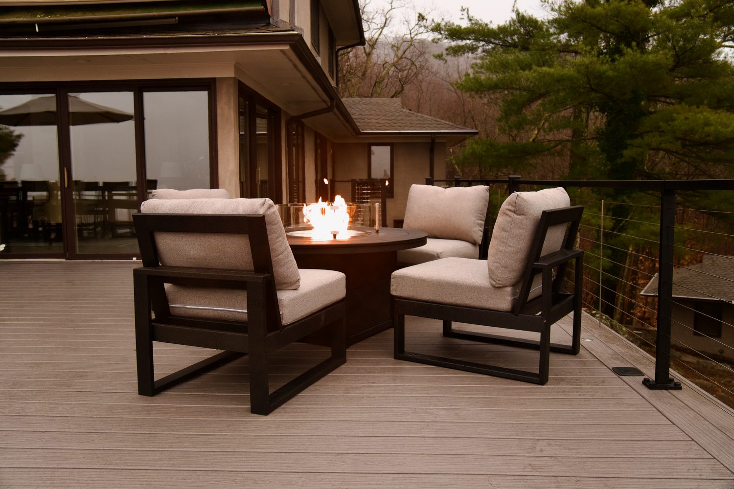 Elevated Trex deck with fire pit and aluminum cable railing overlooking the Hudson Valley — Pinnacle Decking Hudson Valley NY