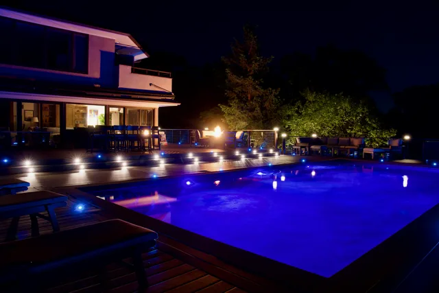 Clifftop pool deck with cable railing above the Hudson, Garrison, NY