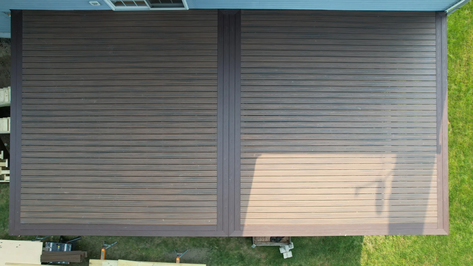 Drone overhead of two-tone Trex deck with picture-frame layout in the Hudson Valley, NY