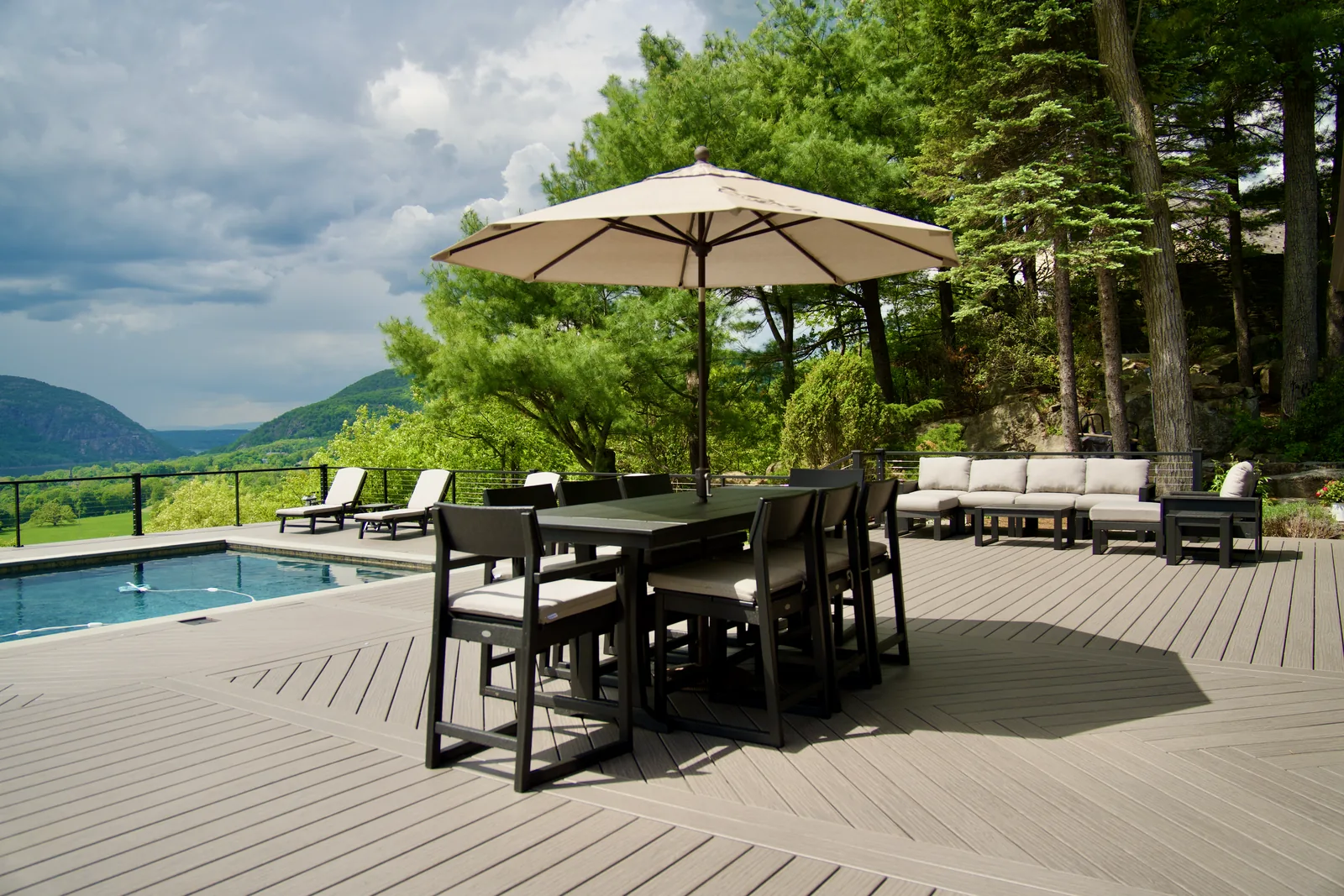 Poolside lounge with river and mountain panorama in Garrison, NY