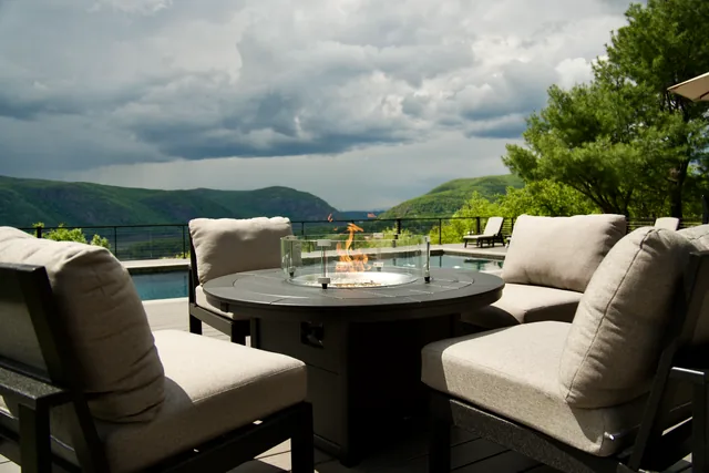 Clifftop pool deck with cable railing above the Hudson, Garrison, NY