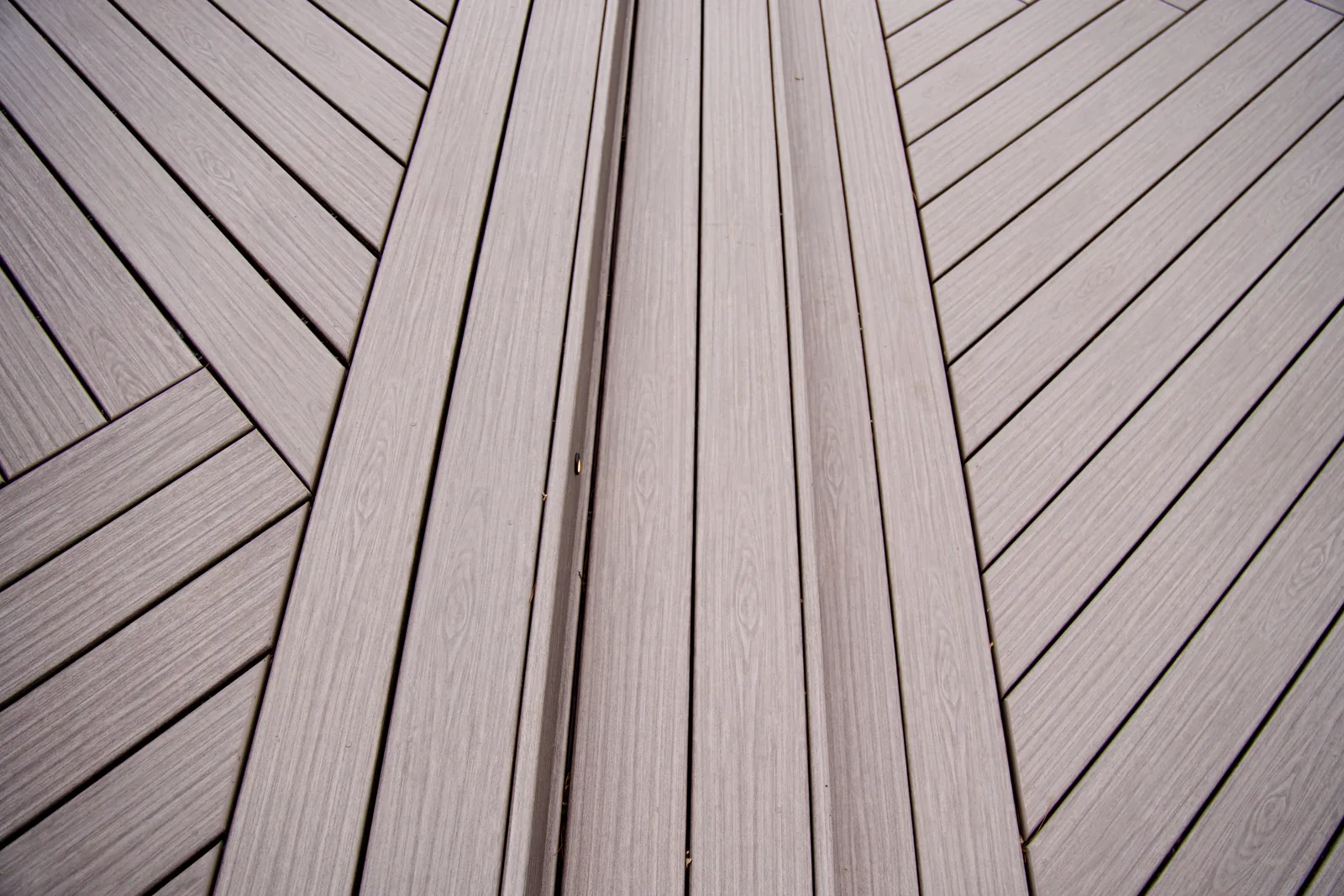 Composite deck board detail with sunburst pattern in Garrison, NY