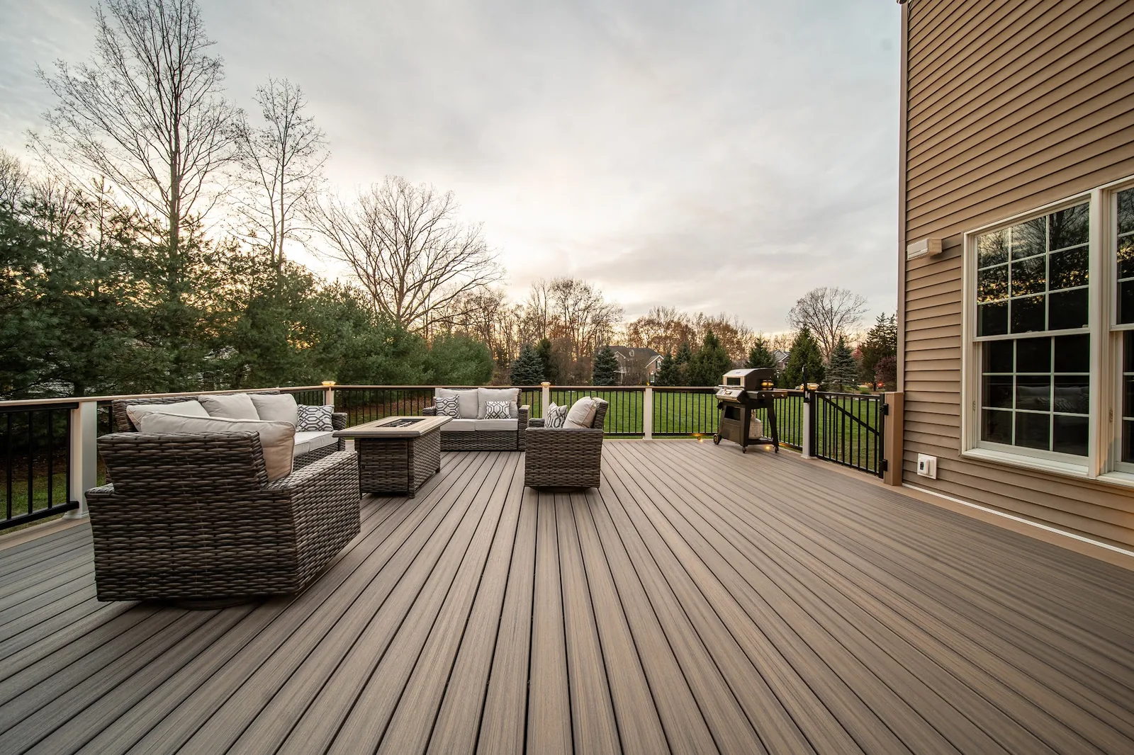 Dusk composite deck with fire feature and lounge set in the Hudson Valley, NY