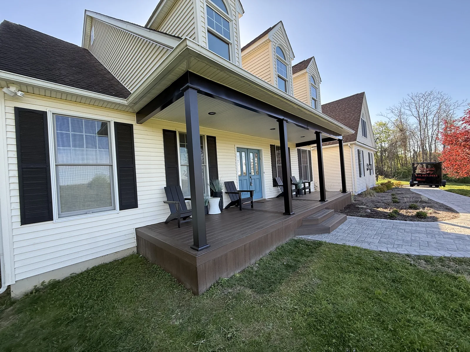 Covered farmhouse deck with black structural aluminum posts and beams, Hyde Park, NY