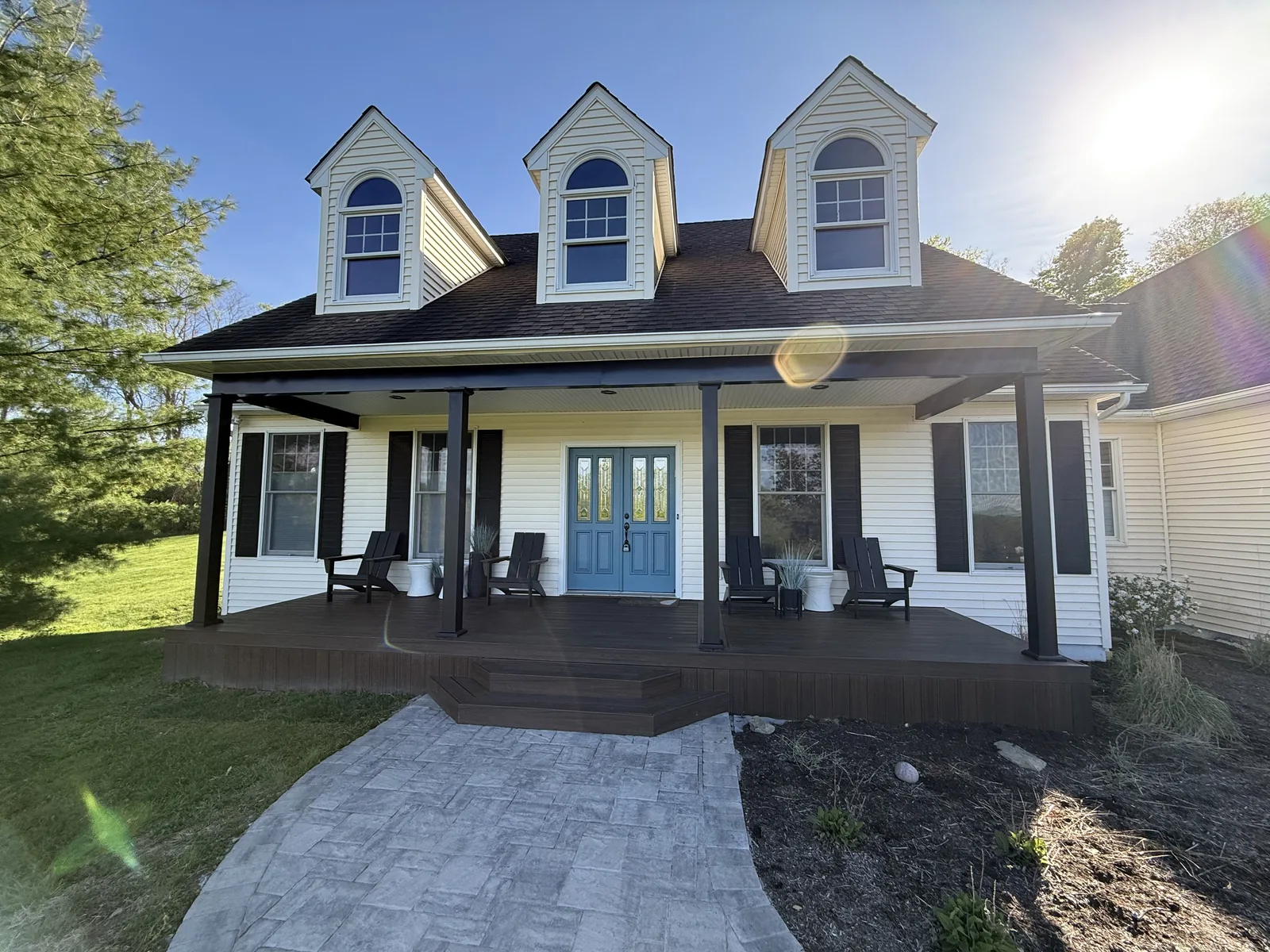 Farmhouse covered porch with black structural aluminum post-and-beam in Hyde Park, NY