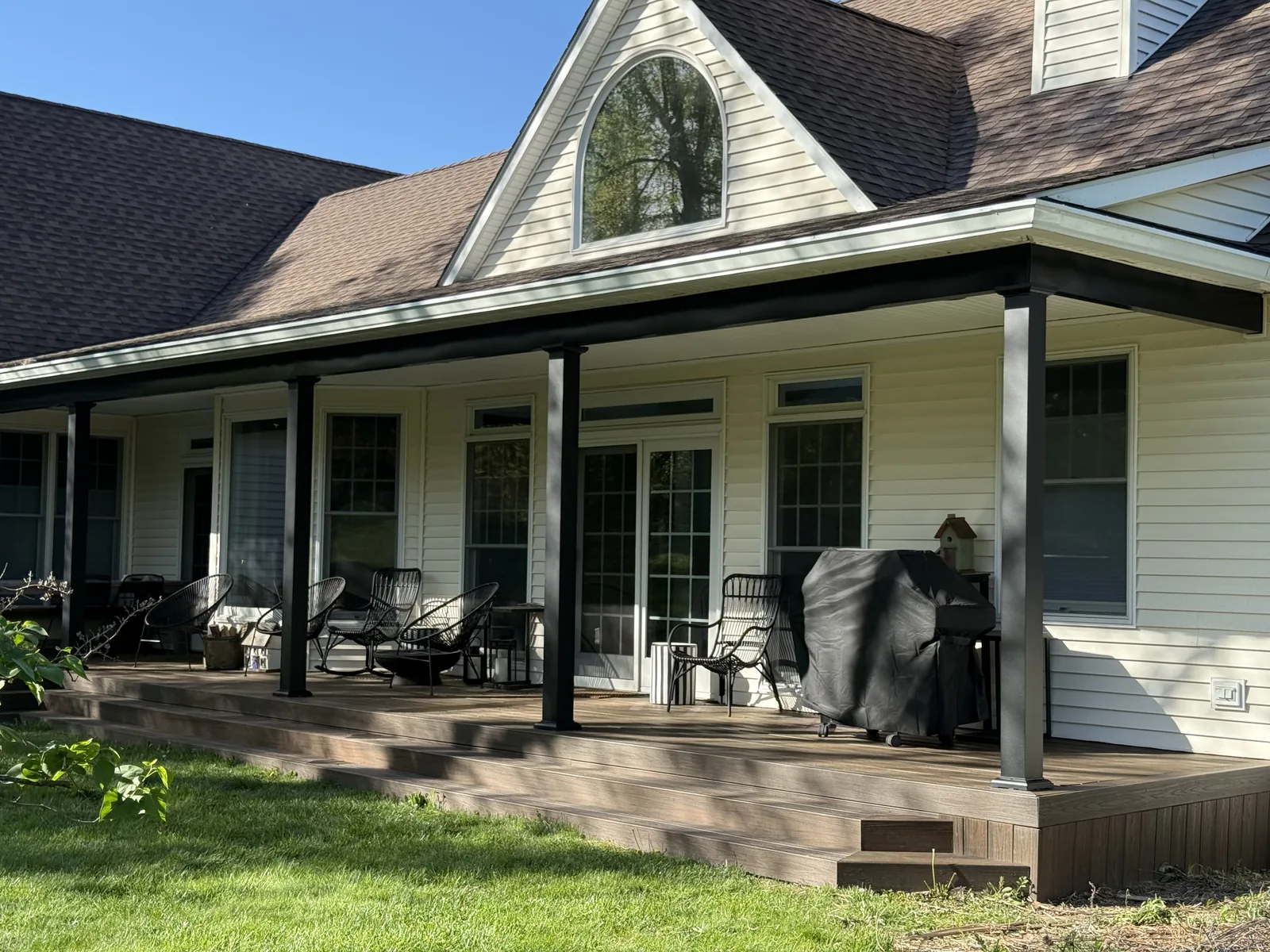 Covered farmhouse deck with black structural aluminum posts and beams, Hyde Park, NY