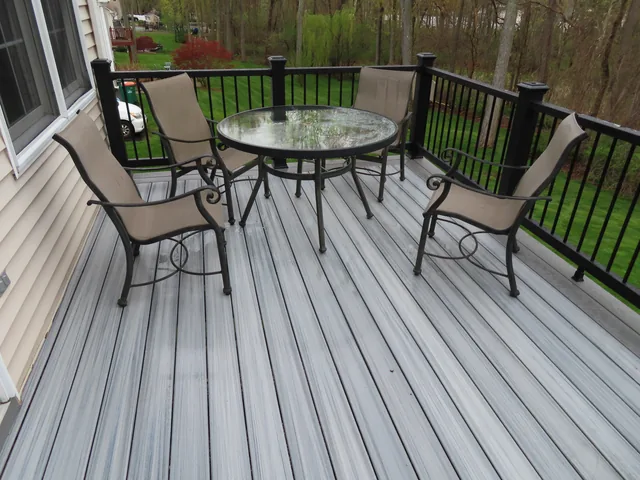 Second-story composite deck with black railing