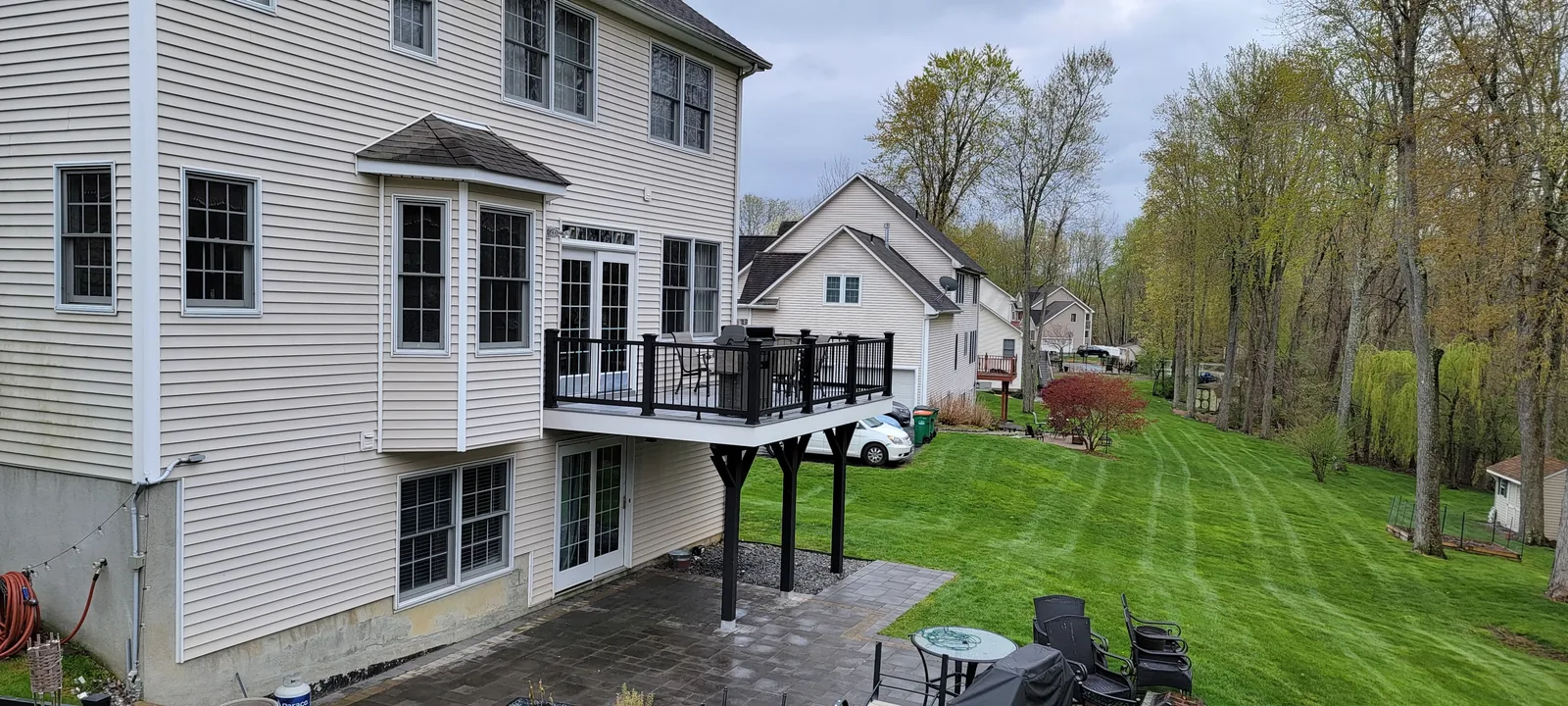Curved elevated deck and railing on the Renaldi project in the Hudson Valley, NY