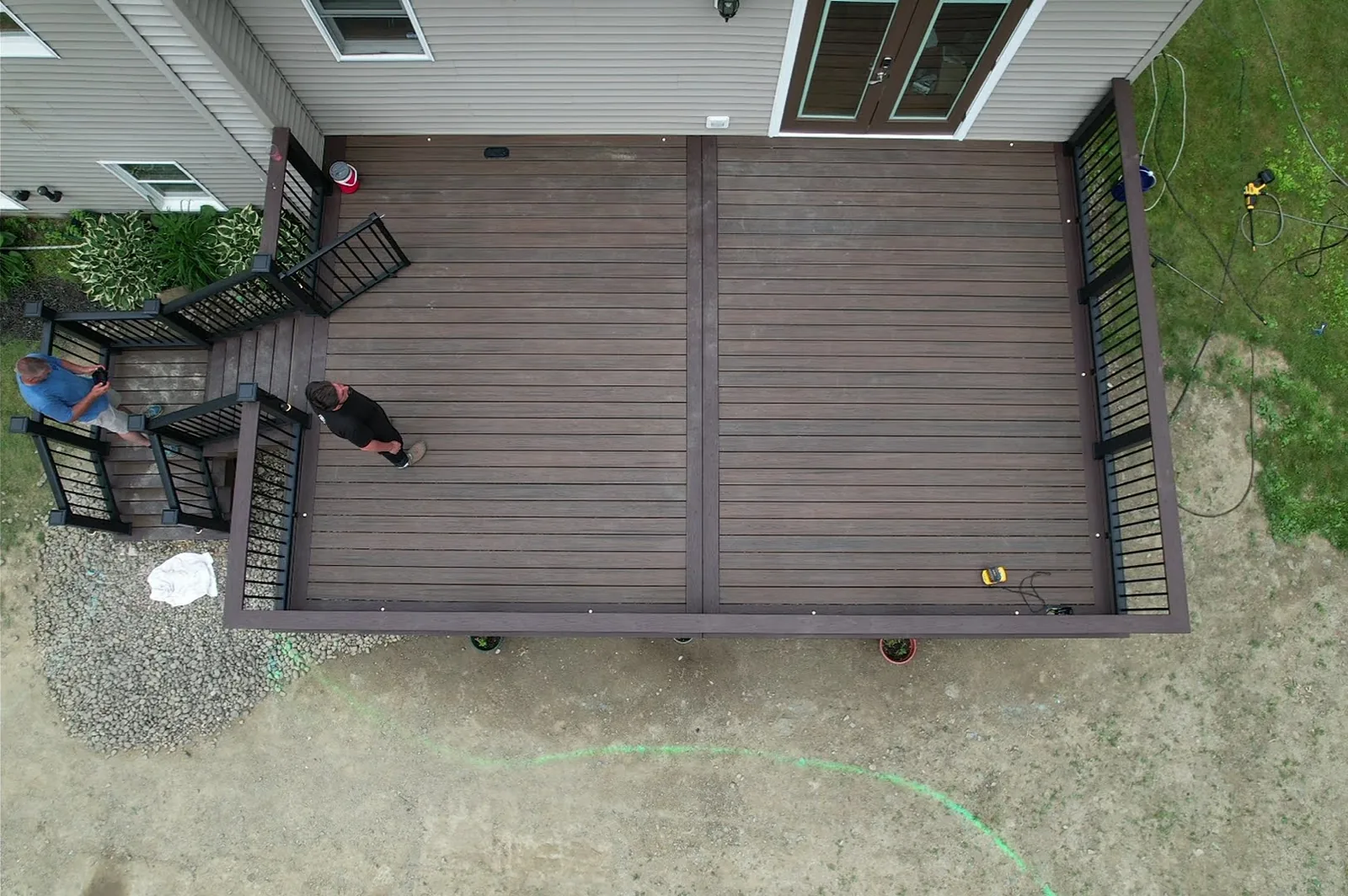 Aerial of a finished rear deck and stairs in Verbank, NY