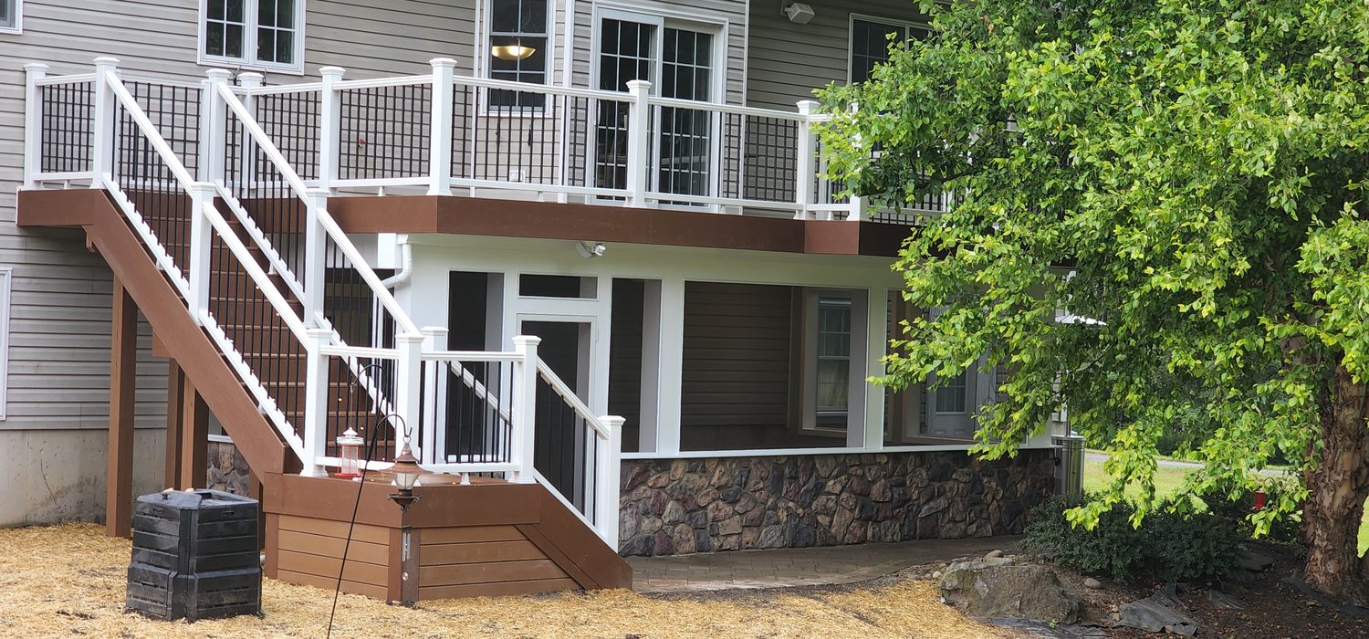 Covered under-deck space with Trex RainEscape finished ceiling and lighting — Pinnacle Decking Hudson Valley NY