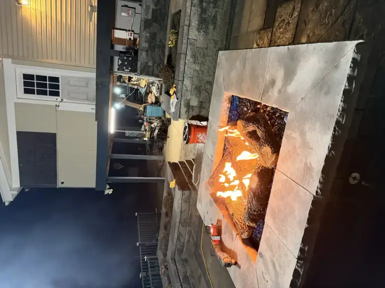 Paver patio and fire pit at night in the Hudson Valley