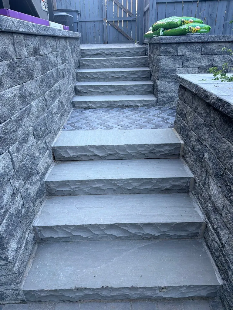 Wide view of stone-clad steps and retaining walls, Rhinebeck, NY