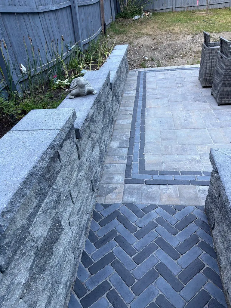 Detail of a stone wall corner with herringbone-pattern steps, Rhinebeck, NY