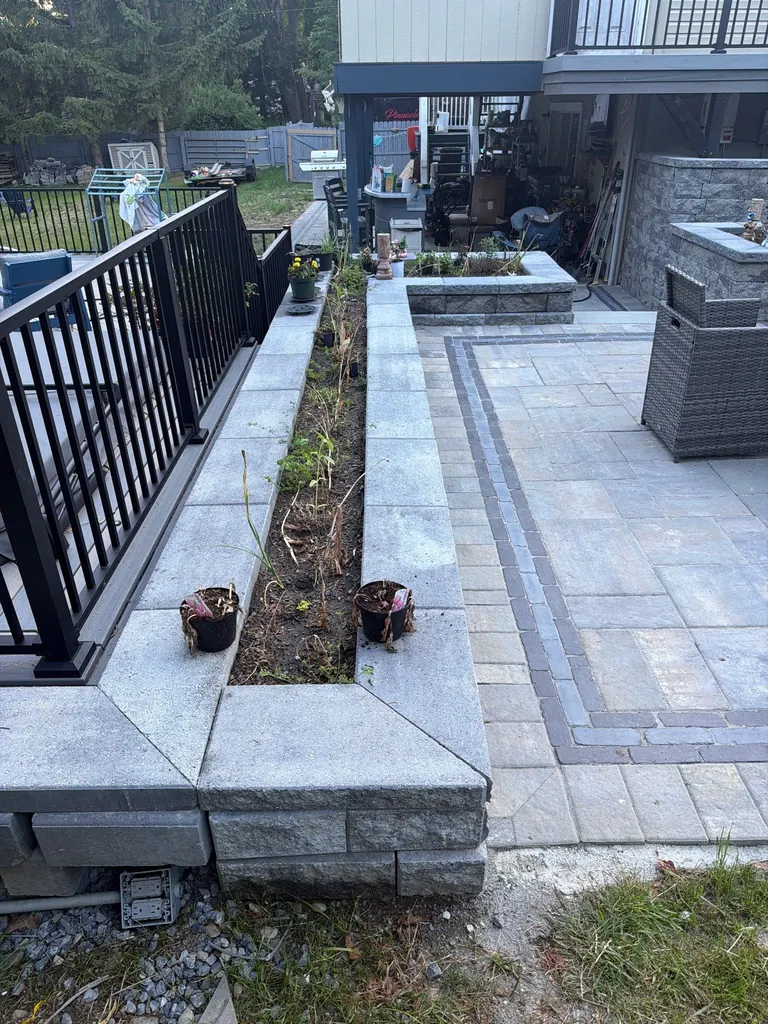 Detail of a paver walkway with a black inlay strip, Rhinebeck, NY