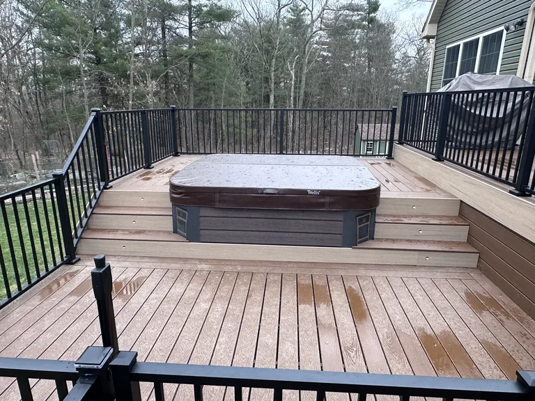 Hot tub set into the finished deck, close view