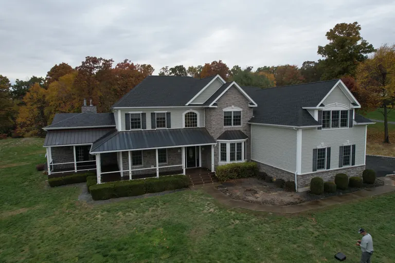 Covered front porch with a standing-seam metal roof, Dutchess County, NY