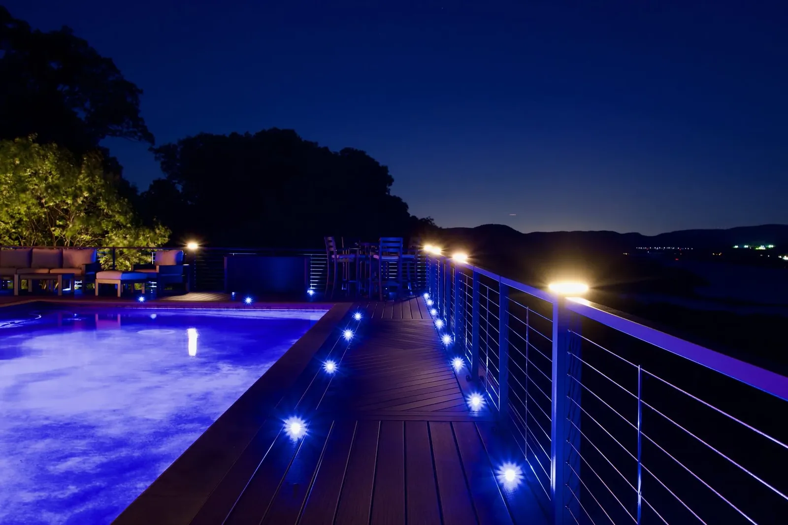 Trex Signature deck with cable railing at sunset in the Hudson Valley