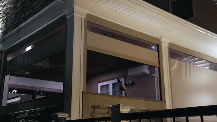 North Solar motorized screens lowering at night