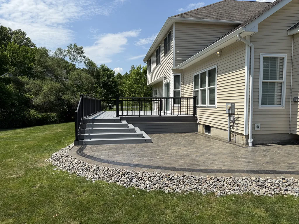 Closer side view of the same deck and paver patio, summer, Orange County, NY